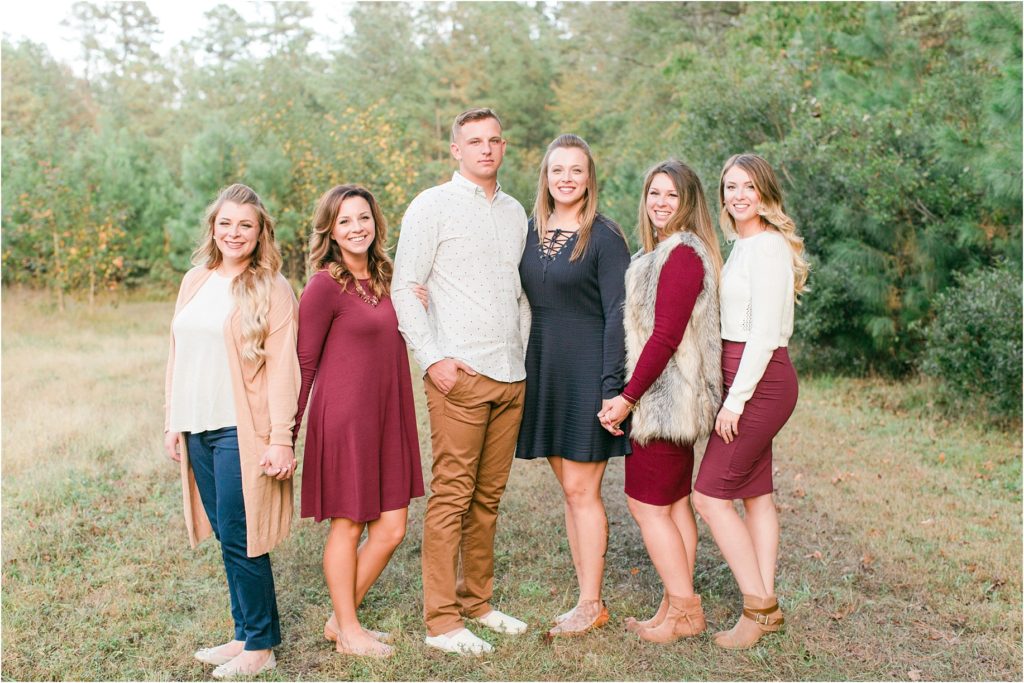 fall family photos in a field